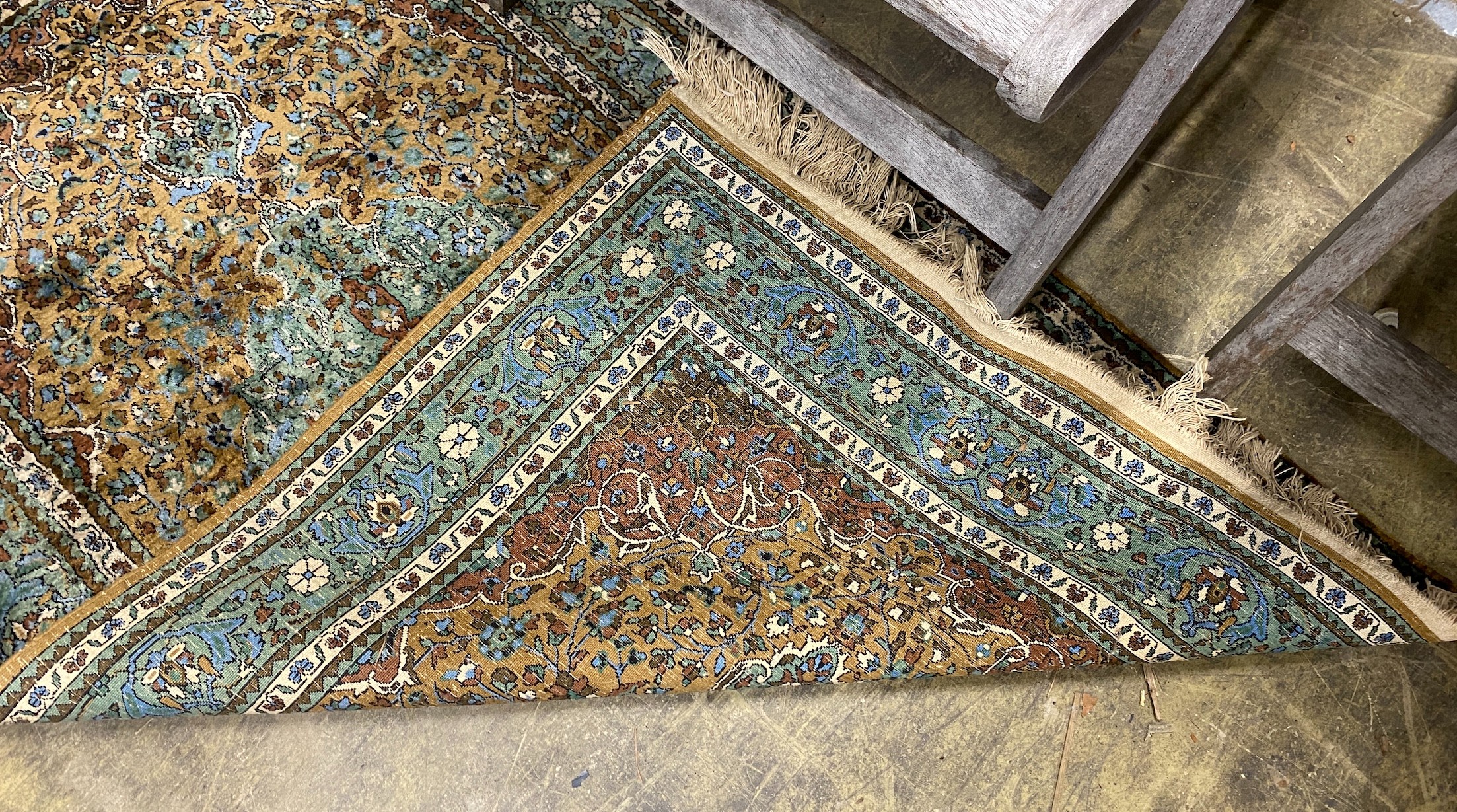 A North West Persian green ground rug, 150 x 90cm